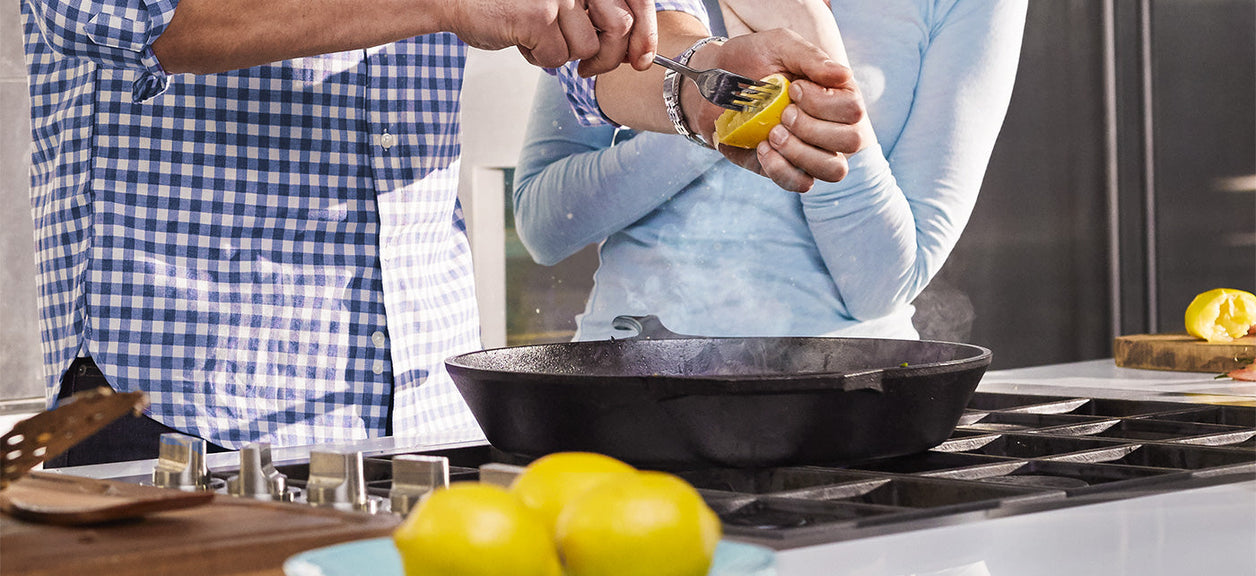 couple cooking in kitchen