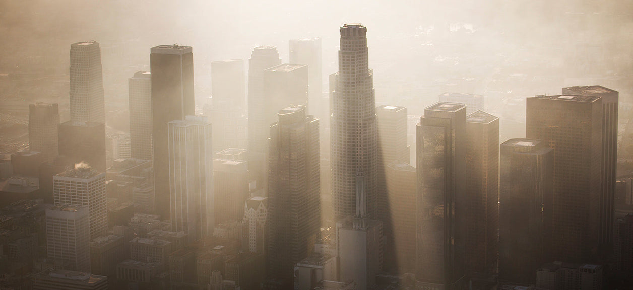 city in background of air pollution