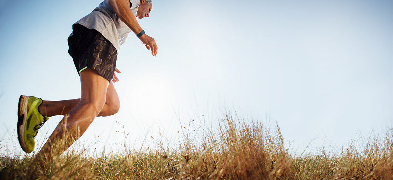 man running in grass