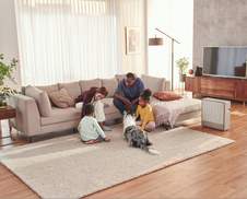 A family wondering how an air purifier impacts pets.